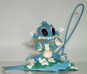 LOISEL - Figurine en plomb 'Fourreux fleurs'